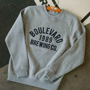 grey crewneck sweatshirt with embroidered "Boulevard 1989 Brewing Co."