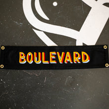 Load image into Gallery viewer, A black rectangular pennant that says, &quot;BOULEVARD&quot;, in colorful lettering.
