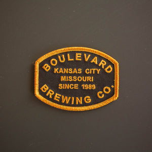 A black and gold patch that says, "Boulevard Brewing Co., Kansas City, Missouri, since 1989."