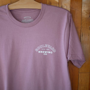 The front small white logo of the Brewery Arch Tee.