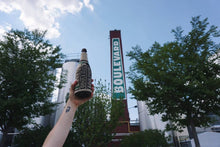 Load image into Gallery viewer, Freaker Knit Koolie &quot;Boulevard&quot; with smokestack in background
