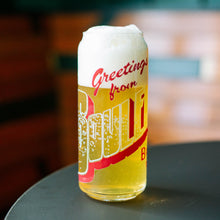 Load image into Gallery viewer, A tall can shaped glass full of light beer with &quot;Greetings from Boulevard&quot; printed on it like a vintage postcard
