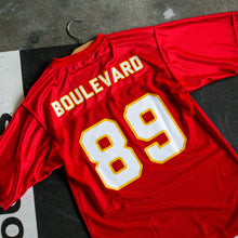 Load image into Gallery viewer, 89 football jersey photographed on the ground.

