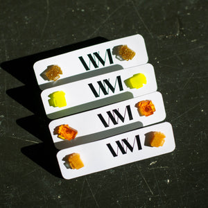All four colors of Beer Mug Earrings on their backings, stacked in a column.