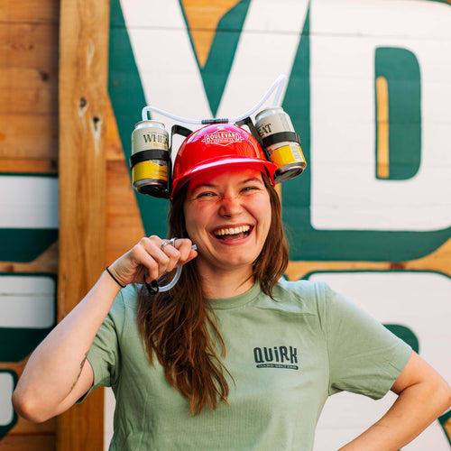 A female model wearing the beer drinking helmet