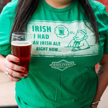 Load image into Gallery viewer, Person wearing a green t-shirt with 'Irish I had an Irish Ale Right Now' text and Boulevard Brewing logo, holding a glass of beer.
