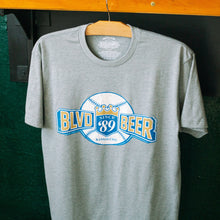 Load image into Gallery viewer, Gray t-shirt with 'BLVD Beer' logo on a hanger against a dark background
