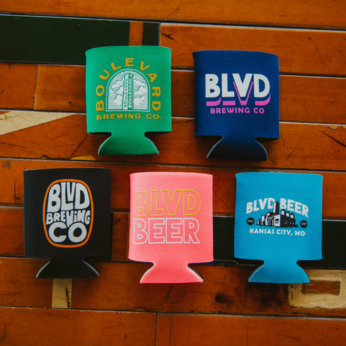 All five varieties of the BLVD Koolies, laid out on a wooden background.