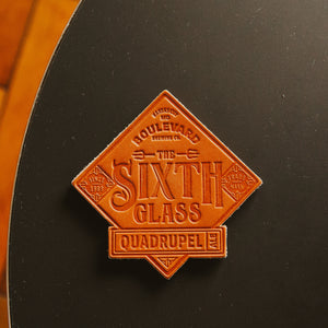 The Sixth Glass Leather Coaster top