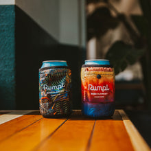 Load image into Gallery viewer, Two beer cans inside of two colorful beer blankets. 
