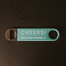 Load image into Gallery viewer, teal paddle style bottle opener with &quot;CHEERS! BOULEVARD BREWING CO&quot;
