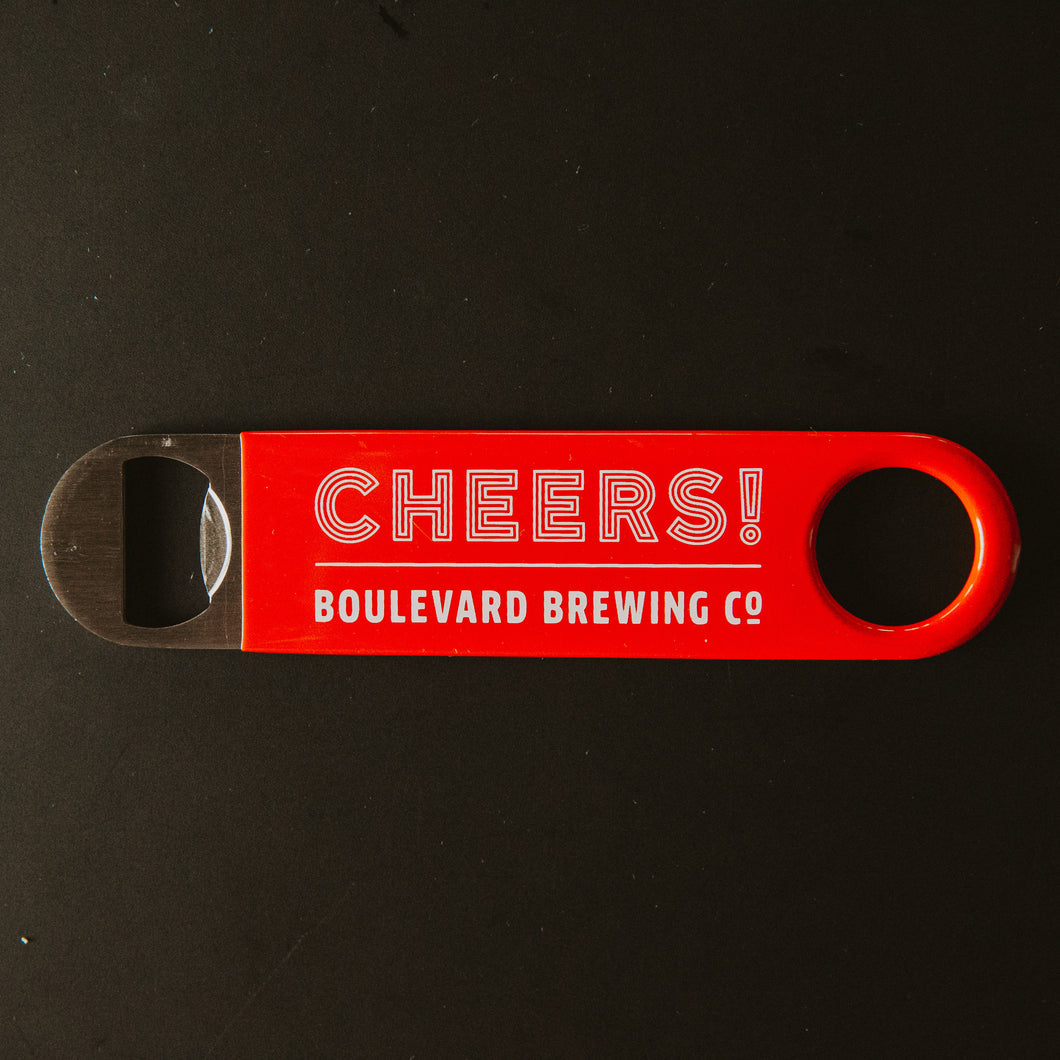 red paddle style bottle opener with 