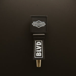 Short black tap handle "BLVD" on brick style handle