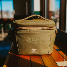 Load image into Gallery viewer, A green cooler in a sunbeam.

