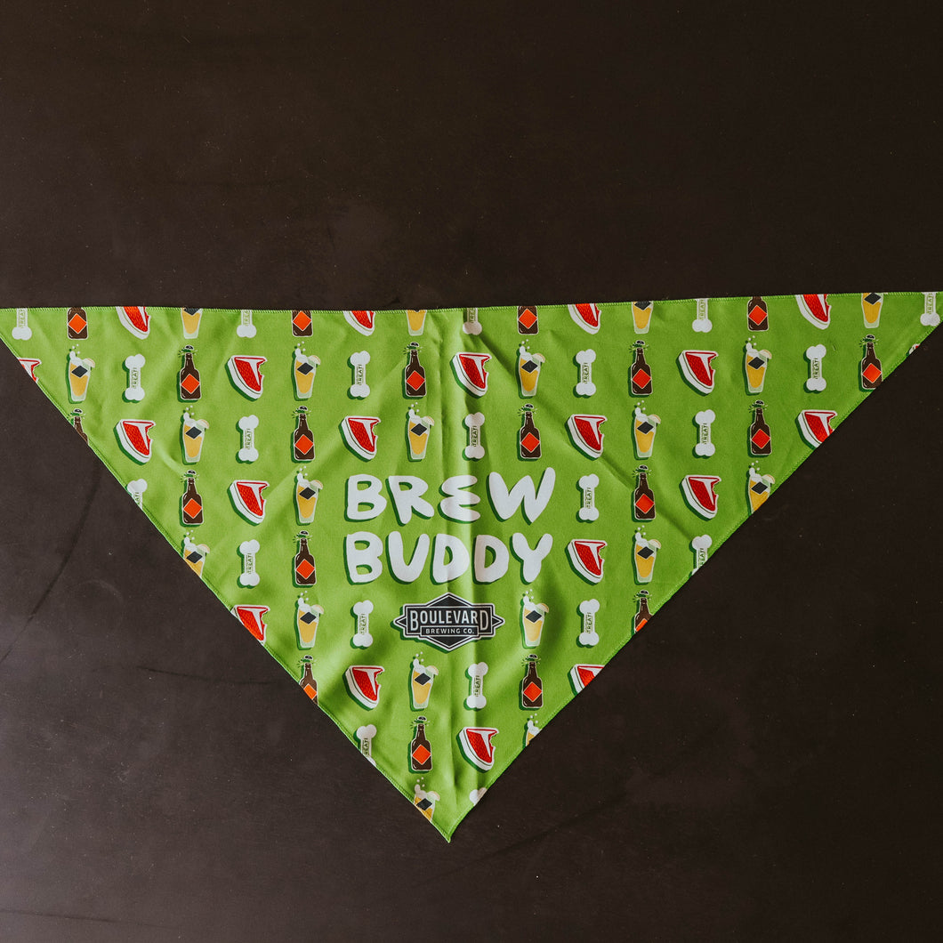 A green triangular bandana with an all-over print.