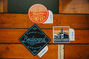 Boulevard Red Sticker, Boulevard Square Sticker and Royal Boulevard Sticker on wood background
